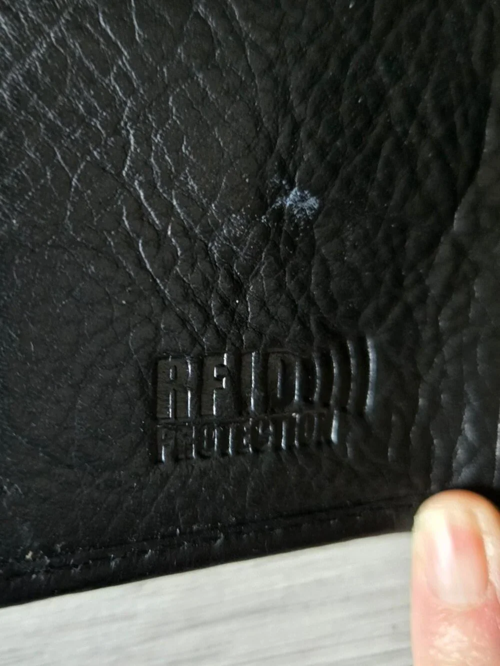 Men's leather RFID black tri-fold wallet